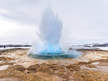 The geothermal area Haukadalur part of the touristic route Golden Circle during winter. Geysir Strokkur.   europe, northern europe, iceland, March