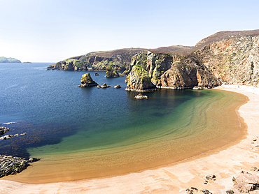 Muckle Roe, a small island of the Shetland Islands. Muckle Roe  (big red isle) is famous for the red, unspoilt granite cliffs and beaches. europe, central europe, northern europe, united kingdom, great britain, scotland, northern isles,shetland islands islands, May