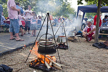 Fish soup, Chowder, Festival  in Baja, Hungary. Every year on the second Saturday in July the town center of Baja is one big open air soup kitchen,Europe, Eastern Europe, Hungary, Baja