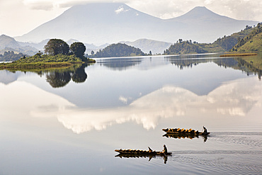 Lake Mutanda near Kisoro with the Virunga Vulcanoes as reflection in the lake, Africa, East Africa, Uganda, Kigezi, Kisoro