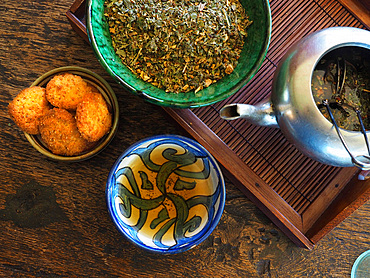 Ginger herbal tea, herbs and homemade organic flour cookies, Umbria, Italy, Europe