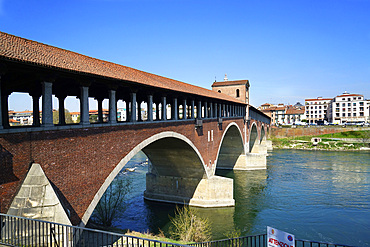 The historic and ancient covered bridge over the Ticino river, Pavia, Lombardy, Itay, Europe