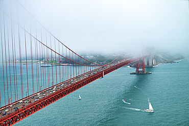 Golden Gate Bridge surrounded by fog, San Francisco.