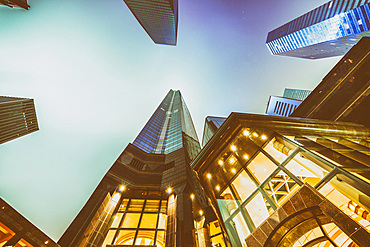 Night skyward view of metropolis skyscrapers. Business and corporate concept.