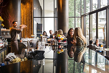 Inside Il Bar at Bulgari Hotel during the aperitivo time. Hotel Bulgari, Milan, Lombardy, Italy, Europe