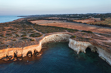 Aerial view, Pillirina. The legend of the Pillirina or the Pellegrina ( pilgrim )is connected to a cave located on Punta del Gigante, the extremity of the Maddalena Peninsula, reachable through the paths from via Capo Passero, Sicily, Italy, Europe