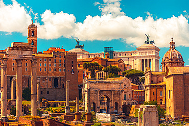 Beautiful panorama view on Altar of the Fatherland and Church of Santi Luca and Martina, Roman Forums and green gardens