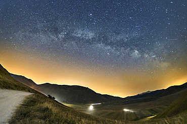 Sibillini Mountains National Park, View of the Milky Way on the Pian Grande, Castelluccio di Norcia, Umbria, Italy, Europe