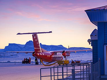 Air Greenland Dash-7. Qaarsut airport near Uummannaq during winter in northern Westgreenland beyond the arctic circle. North America, Greenland, Danish territory