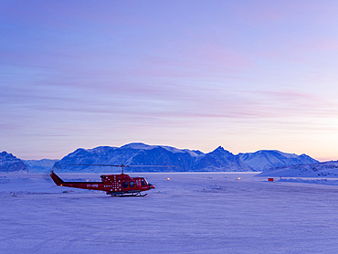 Air Greenland Bell 212. Qaarsut airport near Uummannaq during winter in northern Westgreenland beyond the arctic circle. North America, Greenland, Danish territory