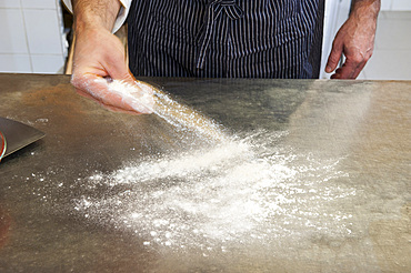 The preparation of a classic Margherita pizza, Italy, Step 01