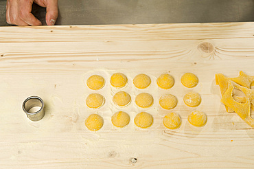 Making Tortelli from fresh pasta by hand. Italy