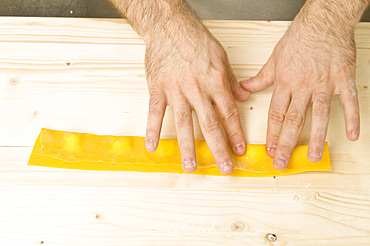 Making Tortelli from fresh pasta by hand. Italy