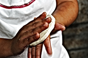 Processing of rice popusa at the Zacatecoluca market. El Salvador, Central America.