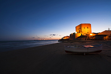 Torre Cabrera, built in the 15th century to defend the warehouses of various goods from pirate attacks in Pozzallo, province of Ragusa, Sicily, Italy, Europe.