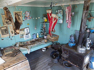 Traditional peat - stone house, used until app. 1985, now part of the local museum. The town Uummannaq in the north of West Greenland, located on an island in the Uummannaq Fjord System. America, North America, Greenland