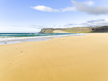 The sandy beach at Breidavik. The remote Westfjords (Vestfirdir) in north west Iceland. Europe, Scandinavia, Iceland