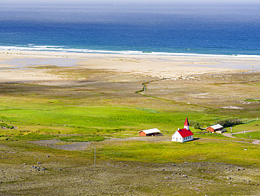 Settlement and beach at Breidavik. The remote Westfjords (Vestfirdir) in north west Iceland. Europe, Scandinavia, Iceland