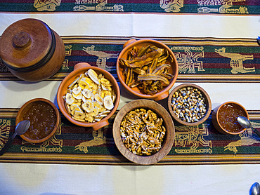 Traditional breakfast in the Altiplano near the Salinas Grandes, dried fruit, nuts, corn and marmalade. Argentina, South America.