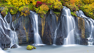 Waterfall Hraunfossar with colorful foilage during fall. europe, northern europe, iceland, september