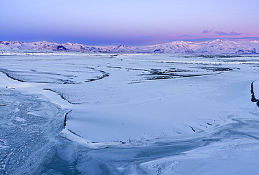 View over the Skeitherarsandur during Winter towards Vatnajoekull after sunset. europe, northern europe, iceland, February