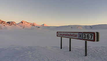 Lonely country road during sunrise in the snowy mountains of Iceland. europe, northern europe, iceland, February