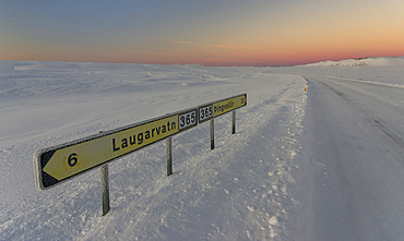 Lonely country road during sunrise in the snowy mountains of Iceland. europe, northern europe, iceland, February