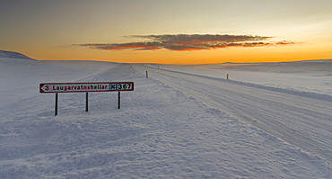 Lonely country road during sunrise in the snowy mountains of Iceland. europe, northern europe, iceland, February