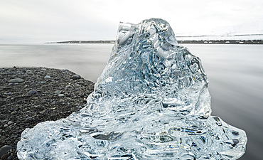 icebergs on black volcanic beach. Beach of the north atlantic near the glacial lagoon Joekulsarlon and glacier Breithamerkurjoekull in the Vatnajoekull NP.europe, northern europe, iceland, February