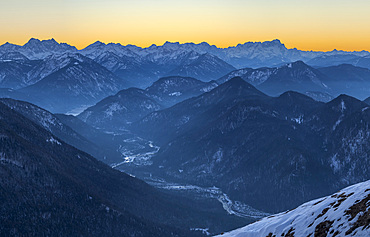 View towards Karwendel and Zugspitze. View from mount Schoenberg near Lenggries in the bavarian alps during winter. Germany, Bavaria