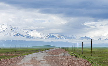 The road to Kyzyl Art mountain pass to Tajikistan. The Alaj valley with the Transalai mountains in the background. The Pamir Mountains, Asia, Central Asia, Kyrgyzstan