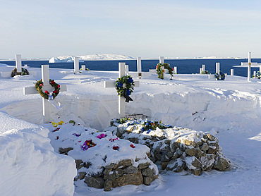 Cemetery. Winter in the town of Upernavik in the north of Greenland at the shore of Baffin Bay. America, Denmark, Greenland