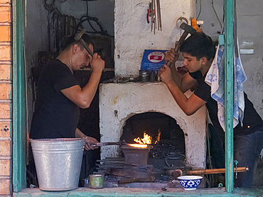 Blacksmiths shops in Jayma Bazaar, one of the greatest traditional markets in central asia. City Osh in the Fergana Valley close to the border to Uzbekistan. Asia, central Asia, Kyrgyzstan