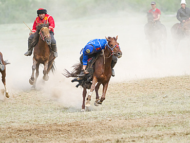 Kok Boru (Buzkashi), traditional equestrian team sport. Festival on the Suusamyr plain commemorating Mr Koshkomul, a sportsman and folk hero of the last century. Kok Boru is listed as UNESCO Intangible Cultural Heritage Asia, central asia, Kyrgyzstan