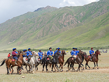 Greeting at the beginning of a match. Kok Boru (Buzkashi), traditional equestrian team sport. Festival on the Suusamyr plain commemorating Mr Koshkomul, a sportsman and folk hero of the last century. Kok Boru is listed as UNESCO Intangible Cultural Heritage Asia, central asia, Kyrgyzstan