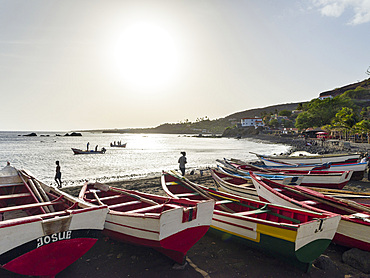 Colorfull traditional fishing boats at the historic waterfront. Cidade Velha, historic center of Ribeira Grande, listed as UNESCO world heritage. Island of Santiago (Ilha de Santiago), Islands of Cape Verde in the equatorial Atlantic.