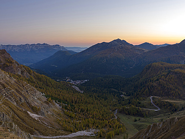 Val Cismon and San Martino di Castrozza during sunset. Pala mountain range (Pale di San Martino) in the dolomites of Trentino. Pala is part of the UNESCO world heritage Dolomites. Europe, Central Europe, Italy