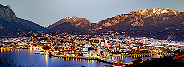 Lecco cityscape and Lake Como at sunset, Lombardy, Italy, Europe