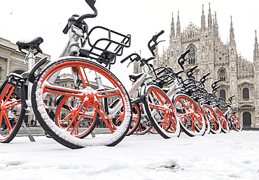 Piazza del Duomo square covered with snow during the meteorological phenomenon called Burian, Milan, Lombardy, Italy, Europe