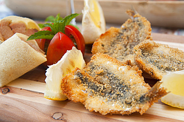 Fried Sardines, Borgo Marinaro, Arbatax, Tortolž, Sardinia, Italy, EuropeCoast; Ogliastra; Sardinian; Sea; East; Red; Seascape; Horizontal