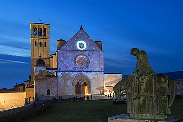 Via Cardinale Raffaele Merry del Val street, Christmas illuminations, Video Mapping of Giotto's Frescoes in the Facade of the Basilica of San Francesco church, Assisi, Umbria, Italy, Europe