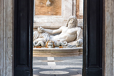 The statue of Marforio, in the courtyard of the Palazzo Nuovo, Piazza del Campidoglio on Capitoline Hill, Turist, Rome, Lazio, Italy, Europe