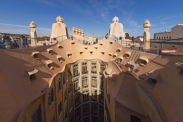 Upper floor and roof chimneys of the apartment building designed by Antonio Gaudi, La Pedrera (Casa Mila), UNESCO World Heritage Site, Passeig de Gracia, Barcelona, Catalonya, Spain 