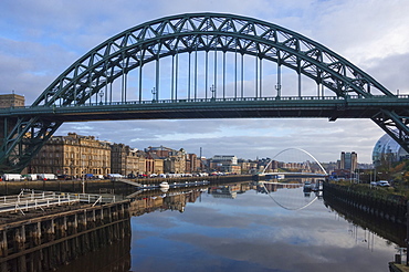 Tyne Bridge framing the Quayside Sunday Morning Market and the Millennium Bridge, River Tyne, Newcastle upon Tyne, Tyne and Wear, England, United Kingdom, Europe