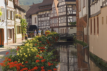 Traditional houses alongside millrace, Annweiler, Pfalzer Wald wine area, Rhineland Palatinate, Germany, Europe