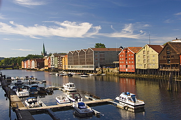 Merchants warehouses and boat moorings along the Nidelva, Trondheim, Norway, Scandinavia, Europe