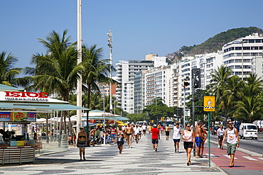 People walking on Copacabana beach promenade, Rio de Janeiro, Brazil, South America