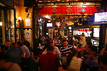 People in a restaurant in the Vila Madalena area known for its bars, restaurants and nighlife, Sao Paulo, Brazil, South America