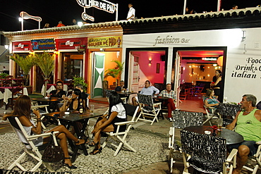 People sitting at outdoor restaurants in Porto Seguro, Bahia, Brazil, South America