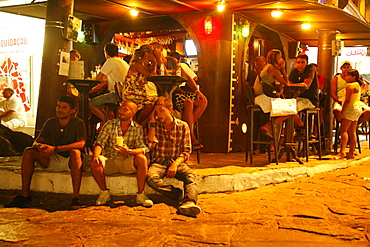 People at a bar on Rua Das Pedras, Buzios, Rio de Janeiro State, Brazil, South America